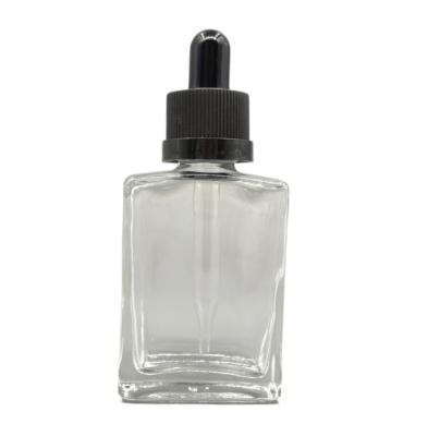 China Square 30ml Glass Cosmetic Bottles  Dropper Childproof cap For Hair Care Oil for sale