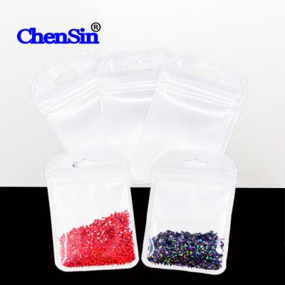 China Small Zip Lock Moisture Proof Bag For Accessories White Plastic Bag With Transparent Zip Lock Packaging Bag For Nail Drill Pearl White Materials for sale