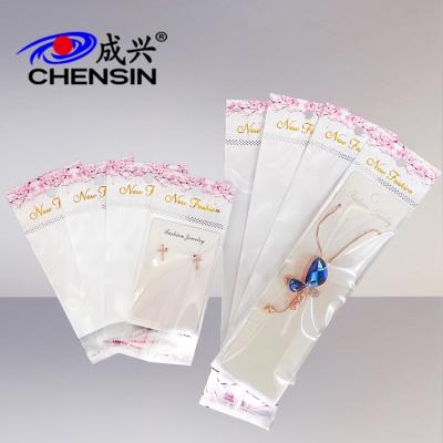 China Moisture Proof Seal Plastic Bags Materials Self Adhesive Translucent White Sleeve For Accessories Cardboard Bag For Earrings And Necklaces for sale