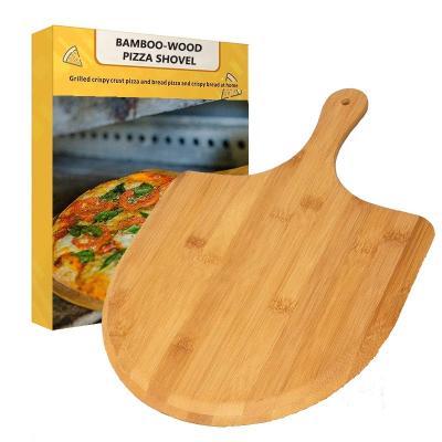 China Large Pizza Peel Premium Sustainable Wood Board Heirloom Bamboo Pizza Paddle For Home Baking Pizza And Bread for sale