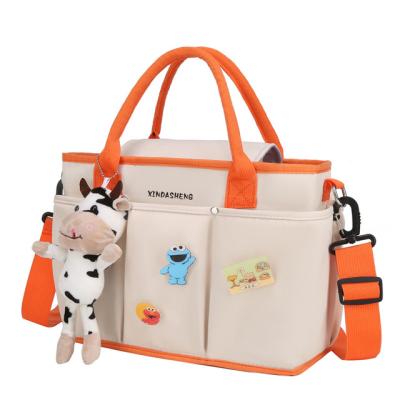 China New Handheld Single Shoulder Water Resistant Diagonal Span Bag Motherbag With Three Pockets Big Mum Bag for sale