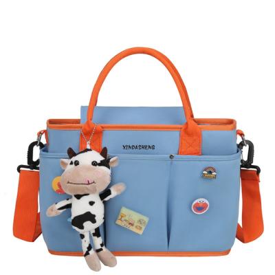 China Handheld Single Diagonal Bag Diaper Bag Water Resistant Shoulder Hutch Mummy Diaper Bag Single Folding Diaper Bag for sale