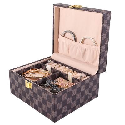 China Custom Hot Selling Handmade Leather PU Jewelry Organizer Jewelry Storage Travel Portable Jewelry Box for sale