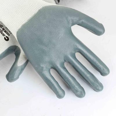 China Palm Coated Industrial Construction Gloves With Nylon Grip Nitrile Work Gloves Mechanic Working Gloves for sale