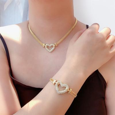 China Iced Out Necklace And Bracelet Gold Plated Heart Jewelry Set , 18K Gold Dubai Jewelry Sets for sale