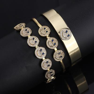 China Iced Out 18K Gold Smile Cuff Bracelet Women Smile Face Charm Bracelet Simple Smile Face Bracelet for sale