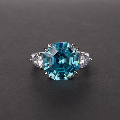 China Iced Out Quality Blue Octagonal S925 Sterling Silver Topaz 5A CZ Wedding Band Rings for sale