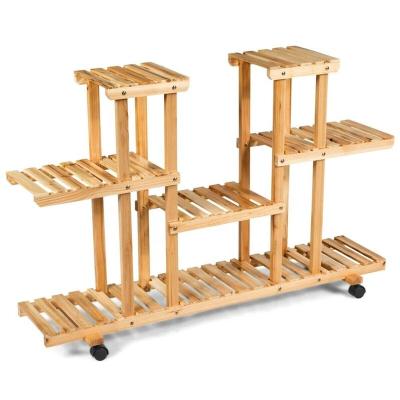 China 4-Tier Breathable Plant Rack Universal Wooden Storage Rack With Wheels for sale