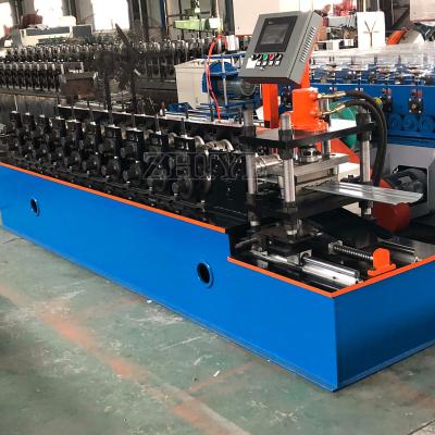 China Construction worksÂ   Iron Profile Making Equipment Automatic Decorative Fence Wall Panel Profile Roll Forming Machine en venta