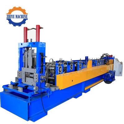 中国 Building material shops automatic changeable steel frame c u z roof purlin roll forming machine 販売のため