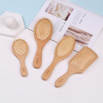 China Private label home massage hot spot travel 2020 promotion salon air cushion wooden bamboo hair comb anti-static for sale