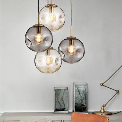 China Modern Dreamy Clear Round Glass Ball Plated Gold Body Hanging Pendant Lamps For Living Room for sale