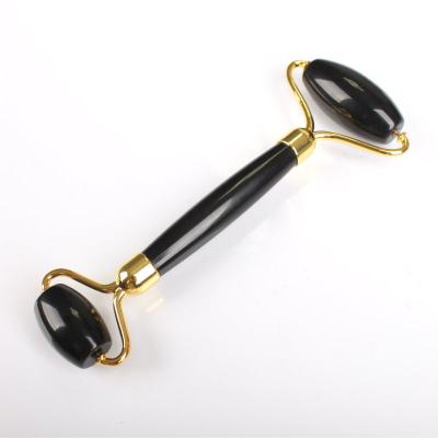 China Bestselling Portable/Cool/Comfortable Natural Black Amazon Jade Roller Stone Gua Double Rollers/Sha Black for Face for sale