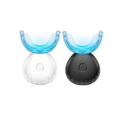 China Hot Selling Home Use Silicone Strip Mouth Tray Cold Blue LED Soft Rechargeable Wireless Teeth Whitening Light for sale