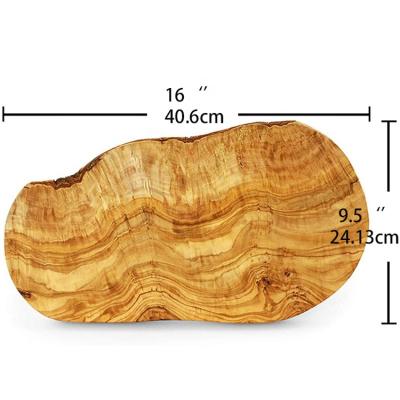 China Real Sustainable Handmade Rustic Natural Olive Wood Irregular Shape Serving Cutting Board for sale