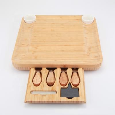 China Sustainable Wholesale Extra Large Cutting Bamboo Charcuterie Cheese Board Set With Hidden Slide Drawers for sale