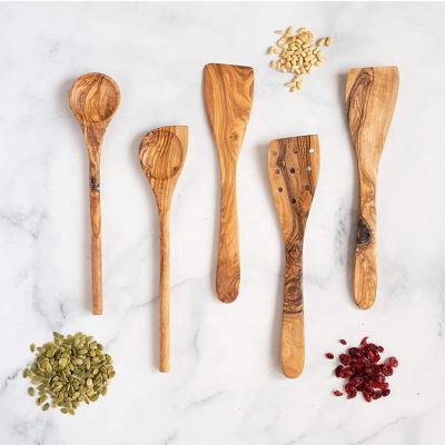 China Viable Food Turner Curved Spoon Solid Spoon Olive Wood Kitchen Cooking Pasta Server Shovel Utensils for sale