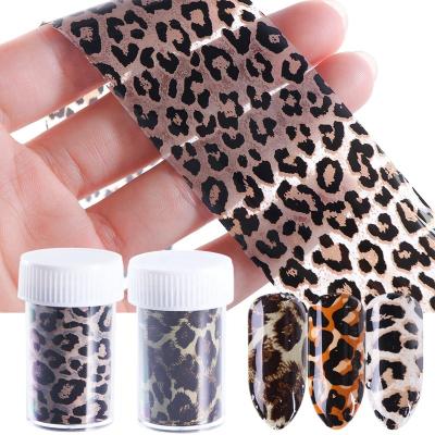 China Festival Holiday Finger Nail Foils 100*4cm Decoration Oosi Different 4 Leopard Printing Bottles Roll Foil Wrapping Leopard Printing Sexy Winter Nail Starry Foil for sale