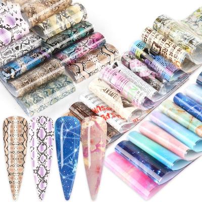 China Festival Holiday Designers Fashion Finger Decoration Oosi Shiny Starry Sky Nail Foil Mixed 50pcs Foil Nail Set Luxury Gold Snakeskin Nail Art Transfer Foil for sale