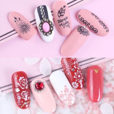 China Festival Holiday Finger Decoration Oosi De Unique Nail Art Stamping Template Flower Animal Oil Transfer Nail Template Stainless Nail Charms 12 Sets for sale