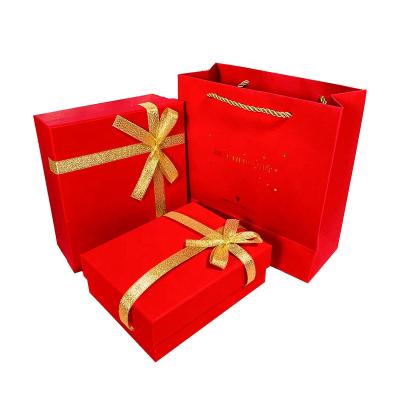 China Recyclable Custom Wholesale Luxury Cosmetic Cardboard Gift Paper Bags Set Boxes With Lid For Clothes for sale