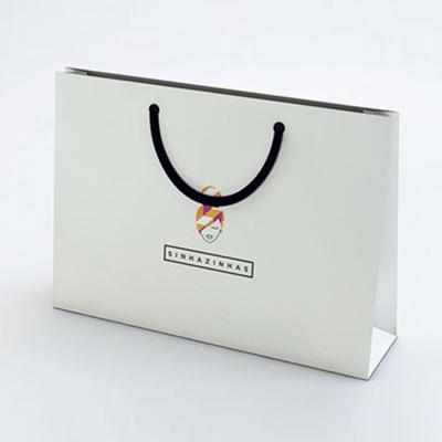 China Small Recyclable Purple Black Paper Gift Bag for sale