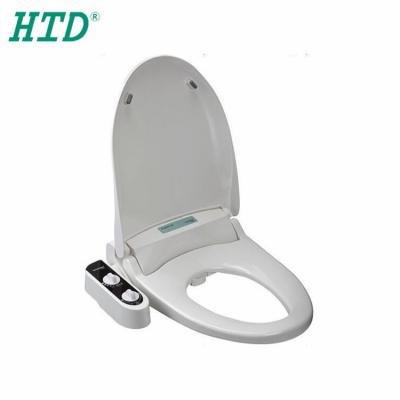 China Double cleaning nozzle + self-cleaning manual plastic toilet portable bidet sprayer for sale