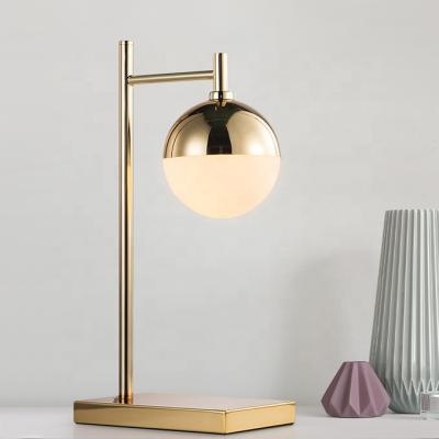 China Modern/simple/luxury gold white glass shade table lamp metal table lamps modern hotel ETL891097 for sale