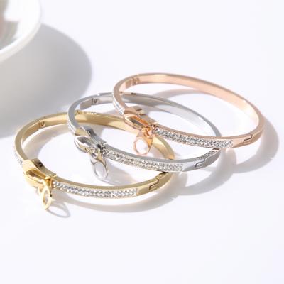 China Crystal Stainless Steel Bangles Trendy Trendy Bangles for Women Girls Wedding Romantic Zipper Design Jewelry Charm Bracelet for sale