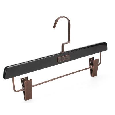 China CLASSIC black outdoor wooden hanger with clips for trousers for sale