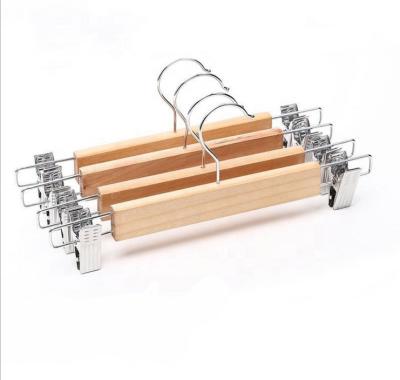 China Cheapest Natural Varnish CLASSIC Hot Sale Lotus Wooden Panty Skirt Hangers with 2-Adjustable Metal Clips for sale