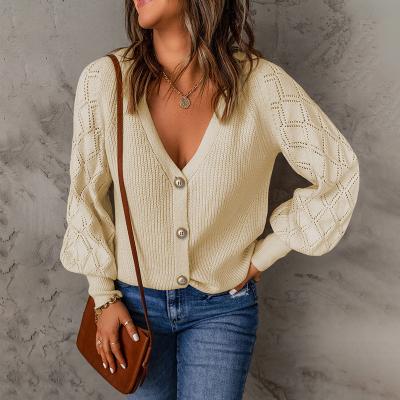 China Autumn Solid Color Rhombus Puff Sleeve Knitted Sweater Jacket Cardigan Loose Straight Women Anti-pilling 2022 Women Knitted Sweaters for sale