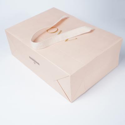 China Recyclable Custom Strong Fashion Luxury Cardboard Paper Gift Gift Packaging Bag for sale