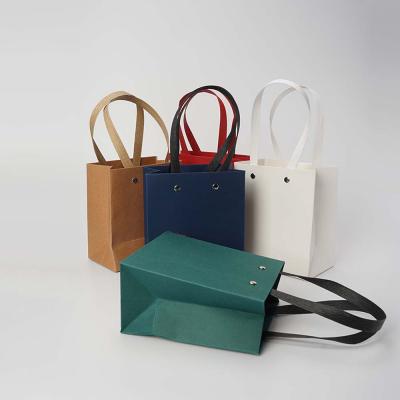 China Recyclable Modern Cheap Custom White Color Paper Bag Custom Design Logo Kraft Jewelry Gift Paper Bags With Ribbon Handles for sale