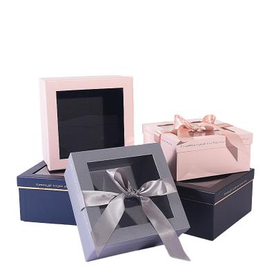 China Handmade Custom Your Own Logo Rigid Ribbon Closure Paper Packaging Gift Box With Clear PVC Window for sale