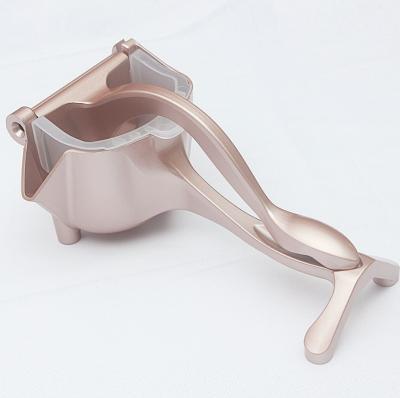 China Viable Manual Fruit Pomegranate Lemon Fruit Squeezer Maker Direct Aluminum Alloy Small Fruit Juicer Baby Squeezer for sale