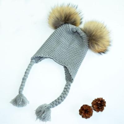 China Wholesale Cute Picture Baby Boy Raccoon Fur Pom Pom Hat With Braids Winter Beanie for sale