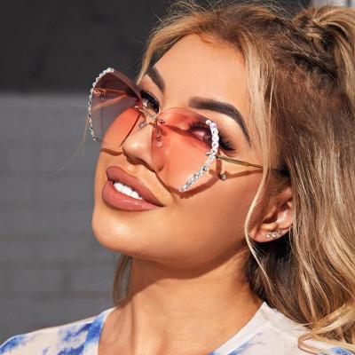 China Fashion sunglasses 2021 women shape bling sunglasses sparkle big frame oversized rhinestone rimless sunglasses for sale