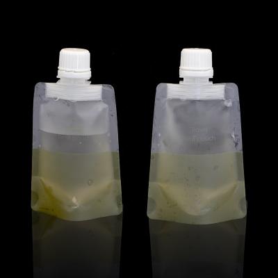 China Recyclable custom clear plastic automatic doypack stand up spout 20ml liquid frosted pouch packer with spout for sale