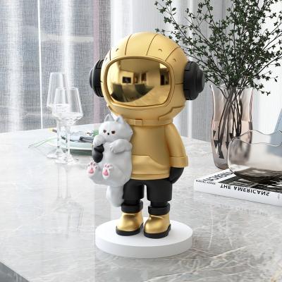 China 2022 China Resin Astronaut Hold Cat Sculptures Living Room Space Astronaut Crafts Ornaments Home Decoration for sale