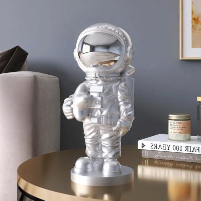 China 2022 China Resin Astronaut Hold Cat Sculptures Living Room Space Astronaut Crafts Ornaments Home Decoration Housewarming Gifts for sale