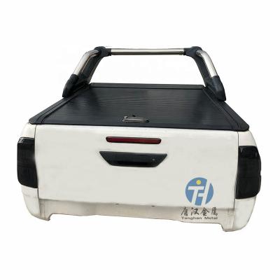 China Waterproof And Durable Aluminum Roll Up Tonneau Cover Retractable Truck Bed Cover For HiluxRevo for sale