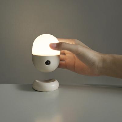 China Home and Office Bedroom Baby Kids Small Motion Sensor Led Night Capsule Creative Design Light Lamp with Magnetic Sensor Holder for sale