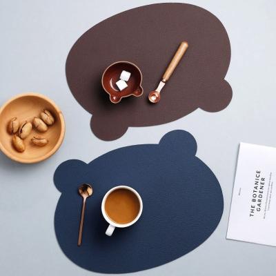 China Viable Custom Design New Leather Baby Kitchen Bear Shape Chevrotin Decorative Place Mat for sale