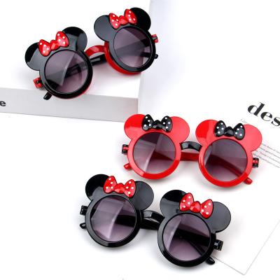 China Sports Sunglasses Children Bow Sunglasses Female Cartoon Link Flip Cute Baby Girl Glasses for sale