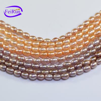 China High luster freshwater rice pearl FEIRUN 7mm pearl FEIRUN 7mm freshwater peach and purple color strand strings for sale