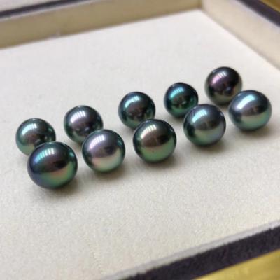 China Wholesale Natural Saltwater Pearl Supply AAA Peacock Black Color Tahitian South Sea Dark Golden Beads for sale