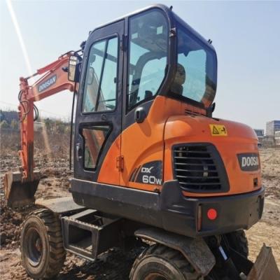 China 2020 Doosan DX60W wielgraver met originele hydraulische pomp Te koop