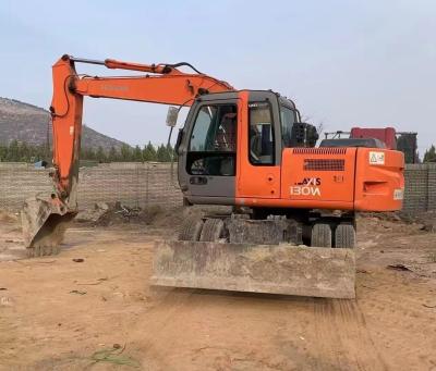 China Gebruikte Hitachi 130W Wheel Excavator te koop. Hitachi Wheel Excavator. Te koop