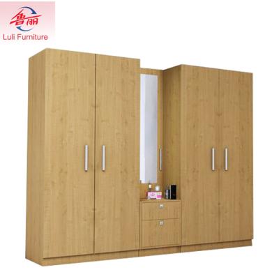 China Eco-friendly L-shaped wardrobe with dressing table inside design for sale